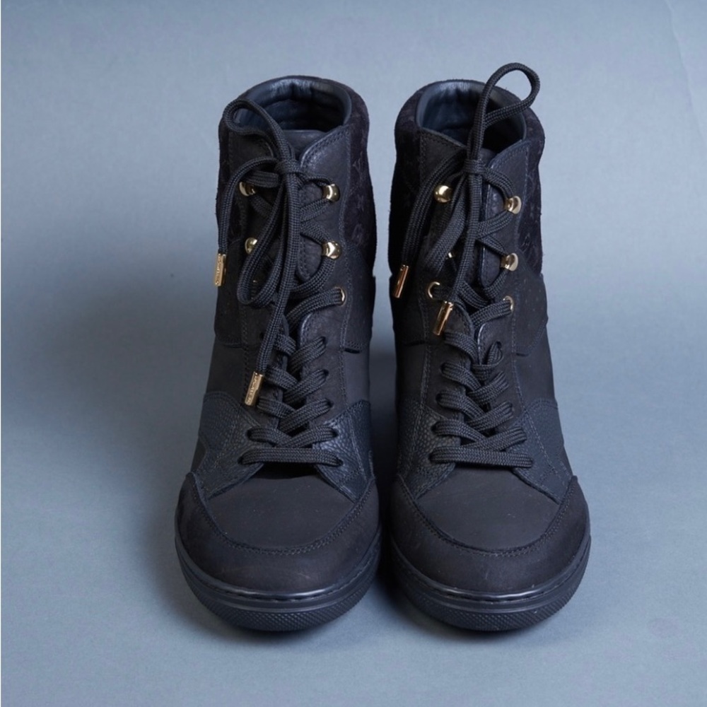 LOUIS VUITTON
High Top Wedge Sneakers